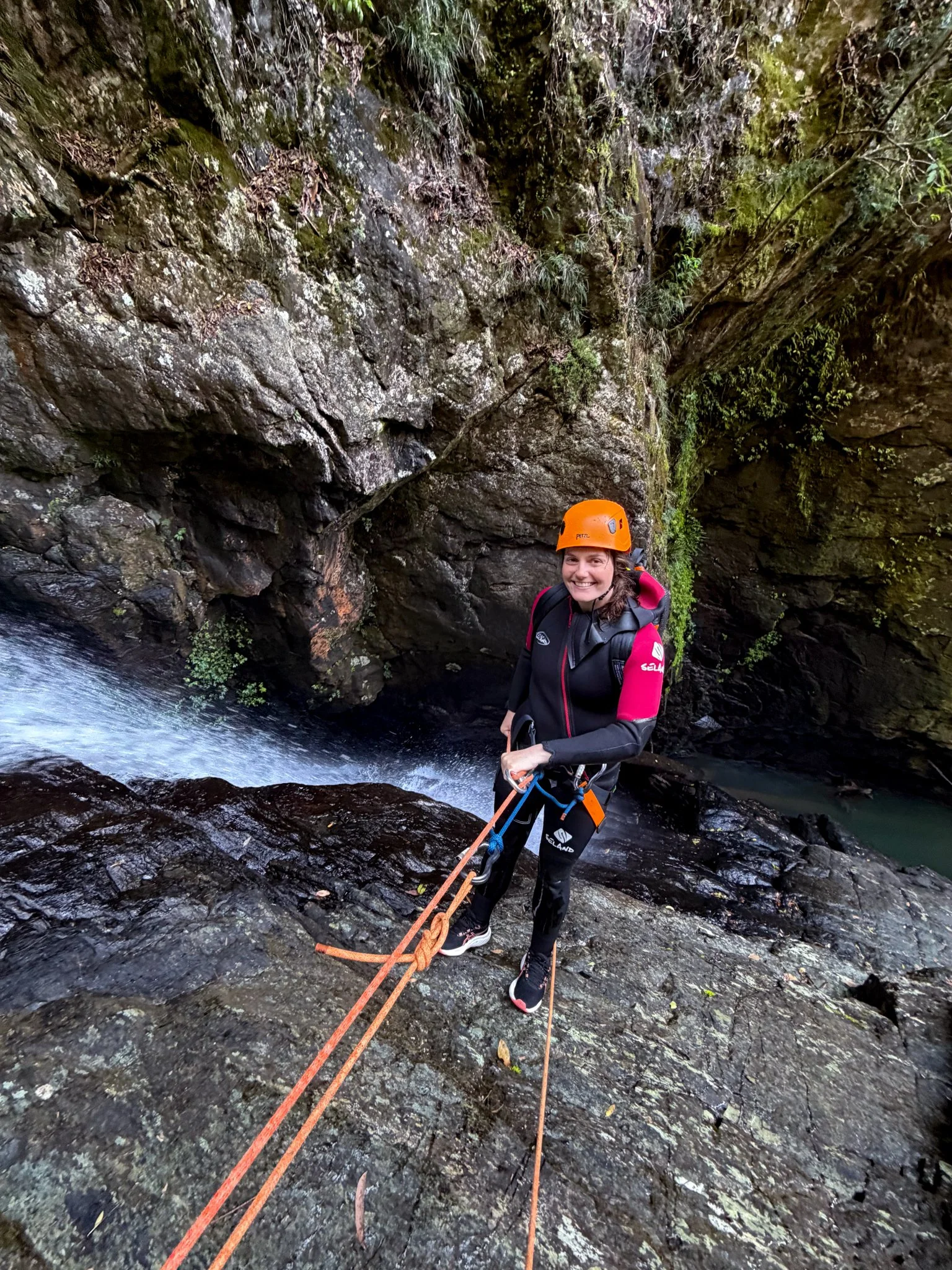A canyoner preparing for an abseil in Bangalore Canyon.
