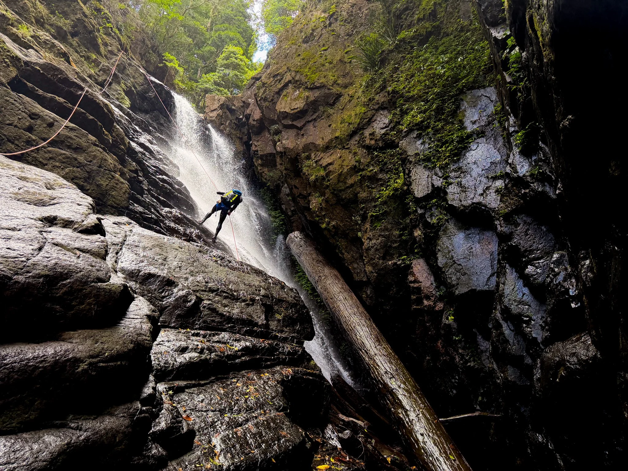 Abseiling beside a waterfall in Bangalore Canyon