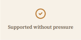 Icon of a check mark inside a circle above the text 'Supported without pressure' on a beige background.