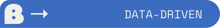 Blue sign with a letter B and arrow pointing right, stating 'Data-Driven'.