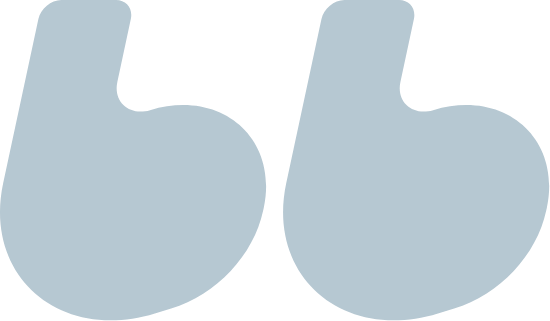 A pair of large blue quotation marks on a black background.