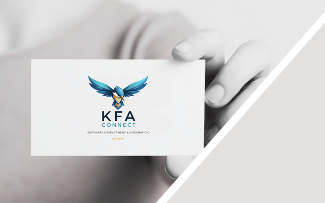 A person's hand holding a business card with a blue and gold eagle logo and the text 'KFA Connect' and 'Software Development & Integration'.