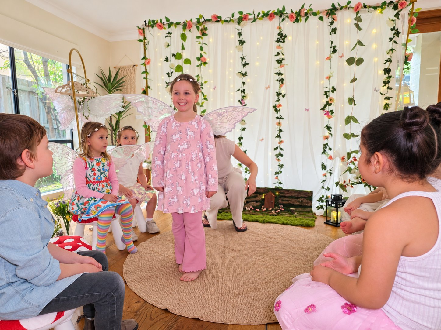 Girl in fairy wings stepping into the fairy circle while her friends watch