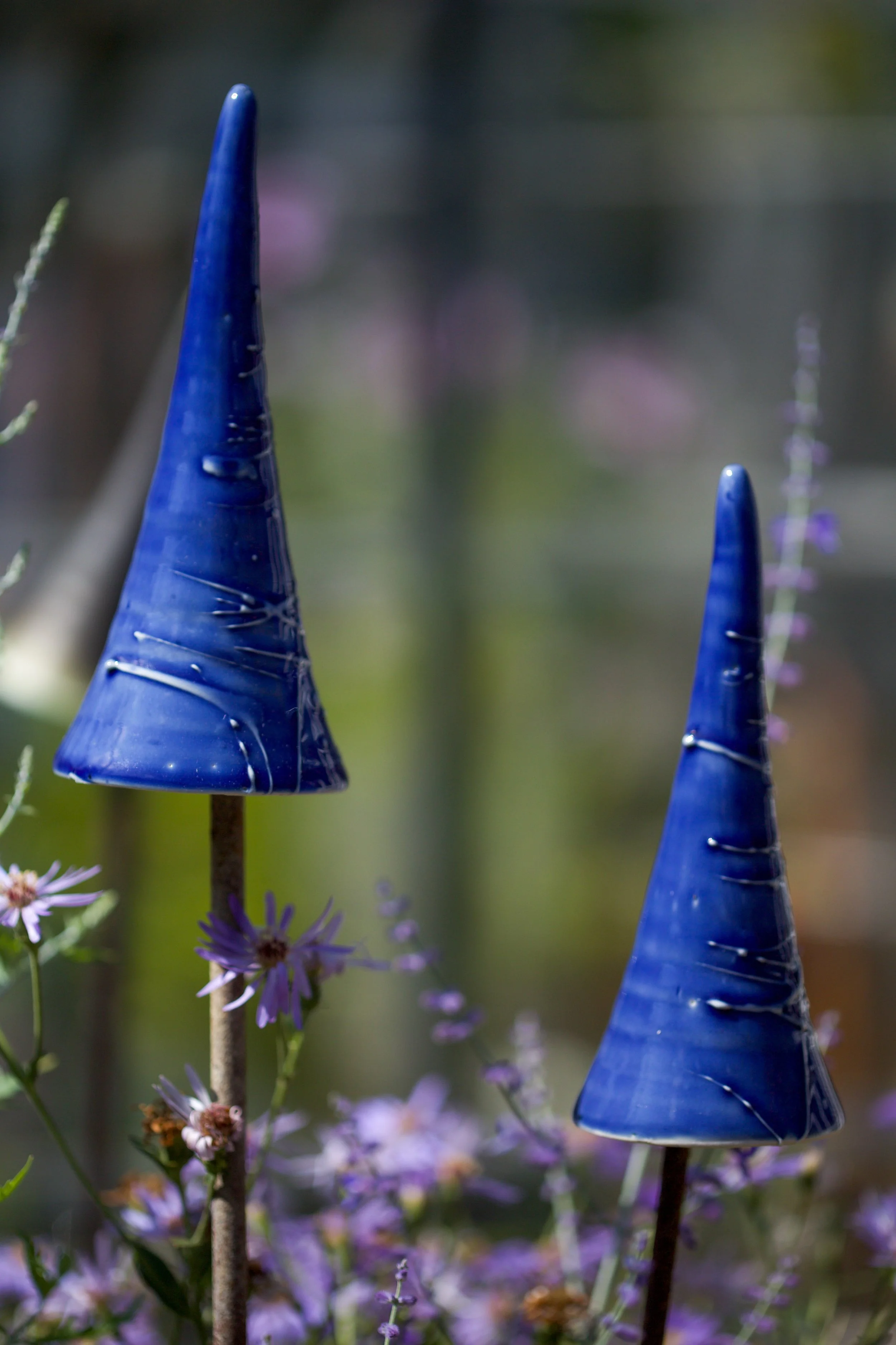 Handmade ceramic mushroom cane topper in blue, by Sheena Bond