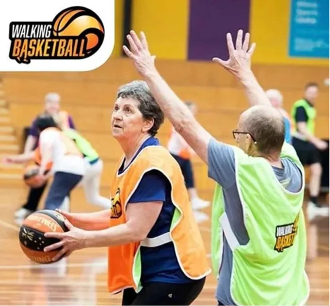 Walking Basketball Promotional of player shooting ball