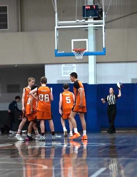 U14 Vikings VJBL players standing in key communicating