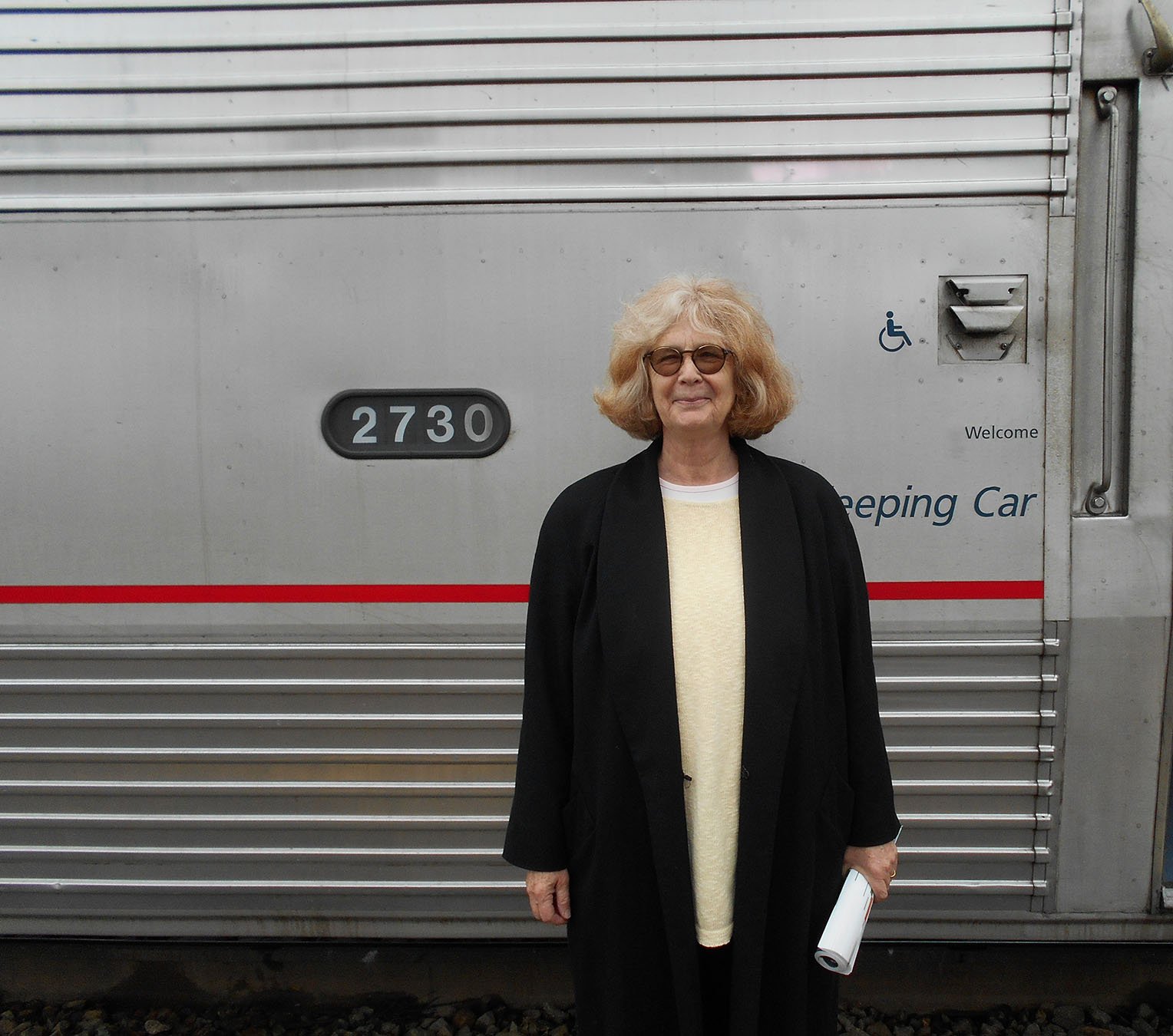 Christi Payne in front of a train