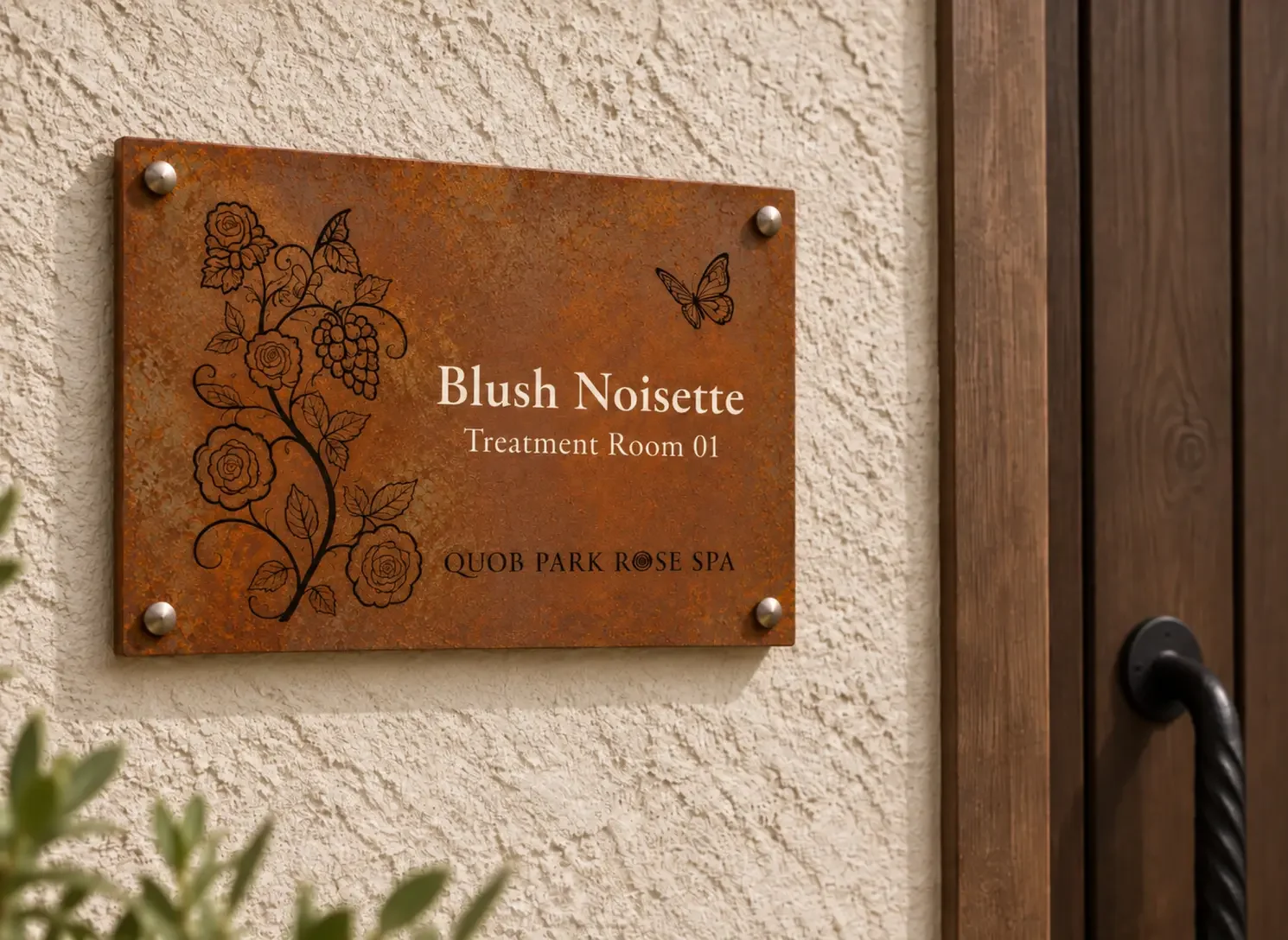 Bespoke treatment room signage using the commissioned Rose Spa pattern