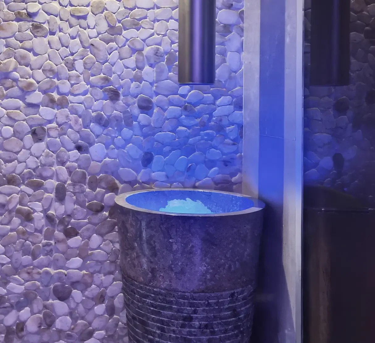 Ice chute and herbal steam experience within the Rose Spa thermal suite