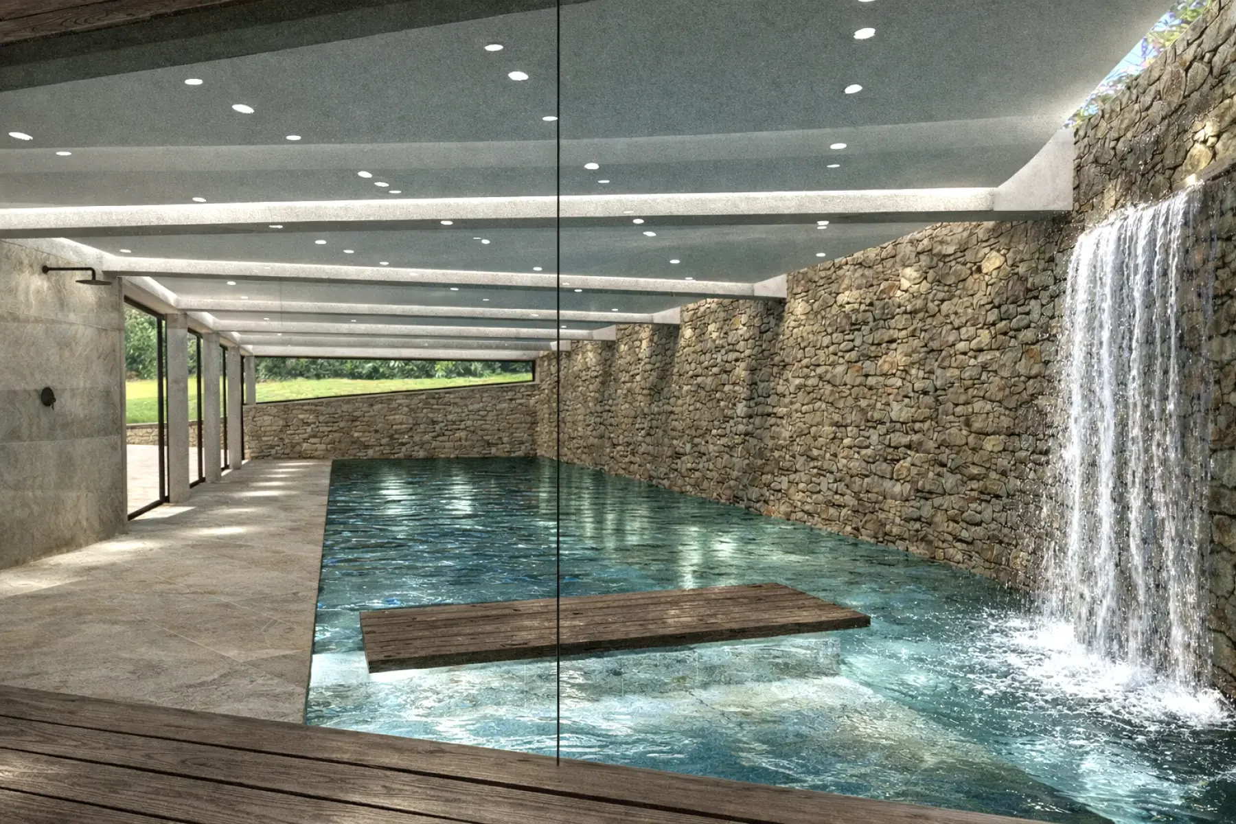 Private indoor swimming pool with stone walls and integrated waterfall massage feature.
