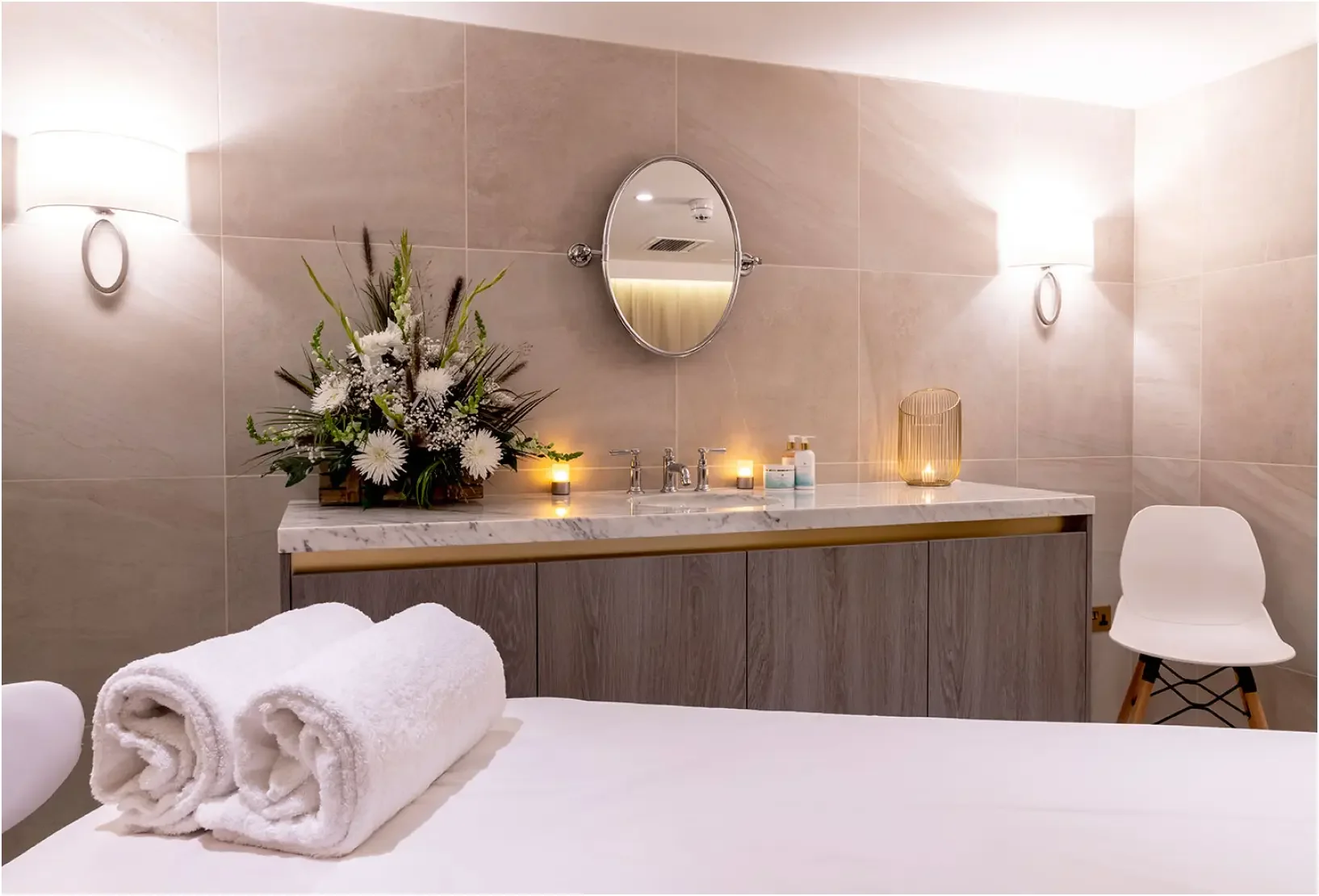 Spa treatment room with bespoke vanity at Champneys Henlow.