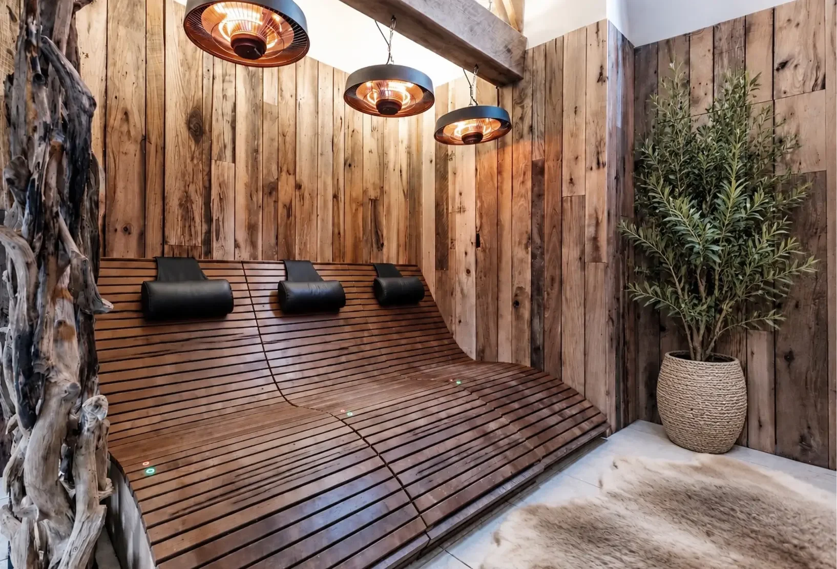 Infrared therapy bench creating a warm relaxation and wellness experience at Quob Park, Rose Spa