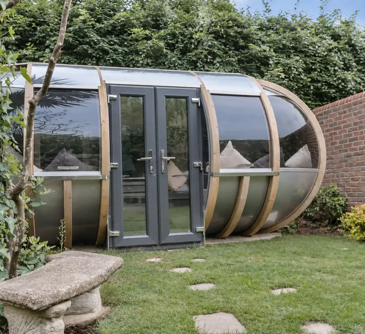 Outdoor relaxation pod nestled within the planting of the Rose Spa garden