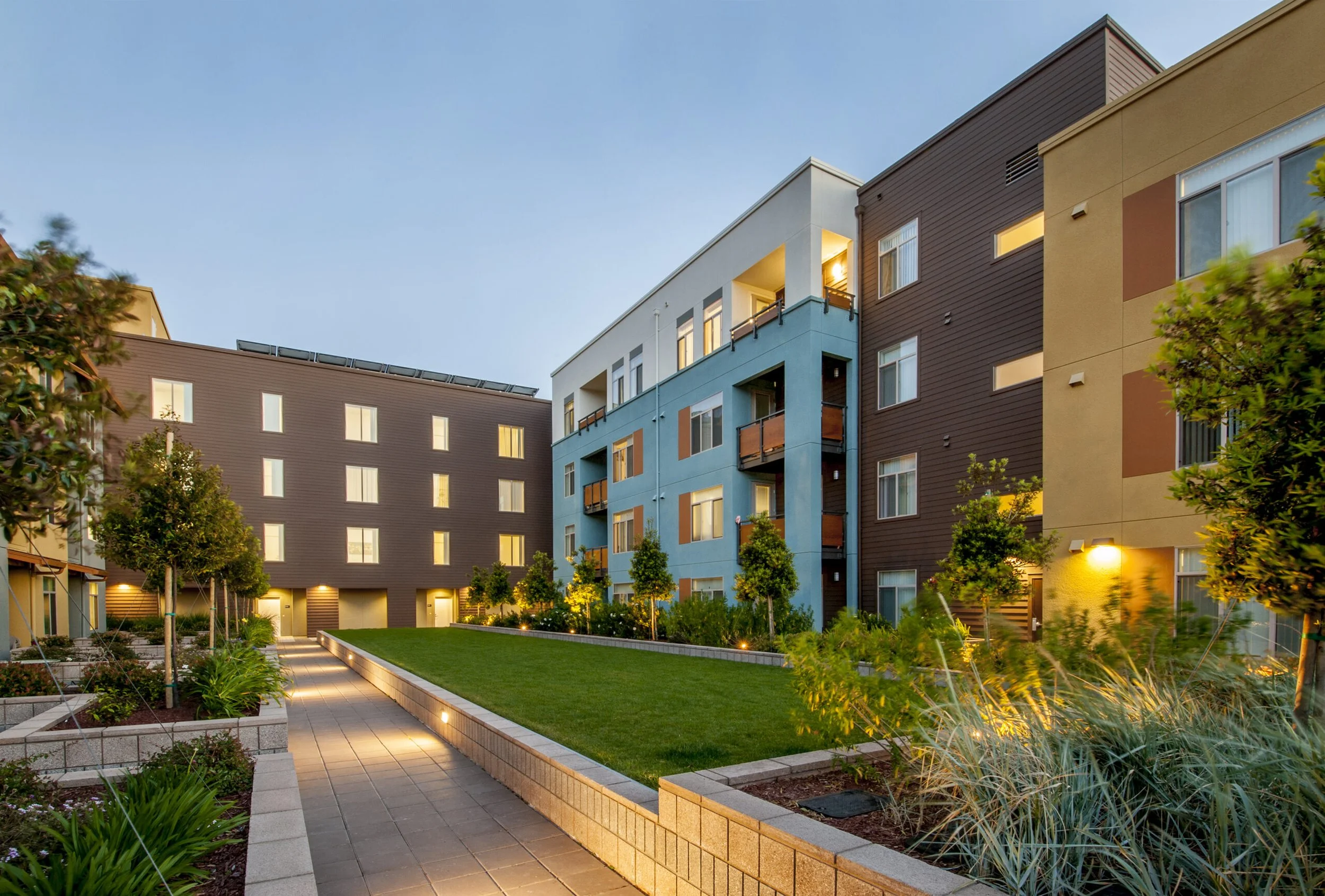 courtyard of apartment complex at dusk