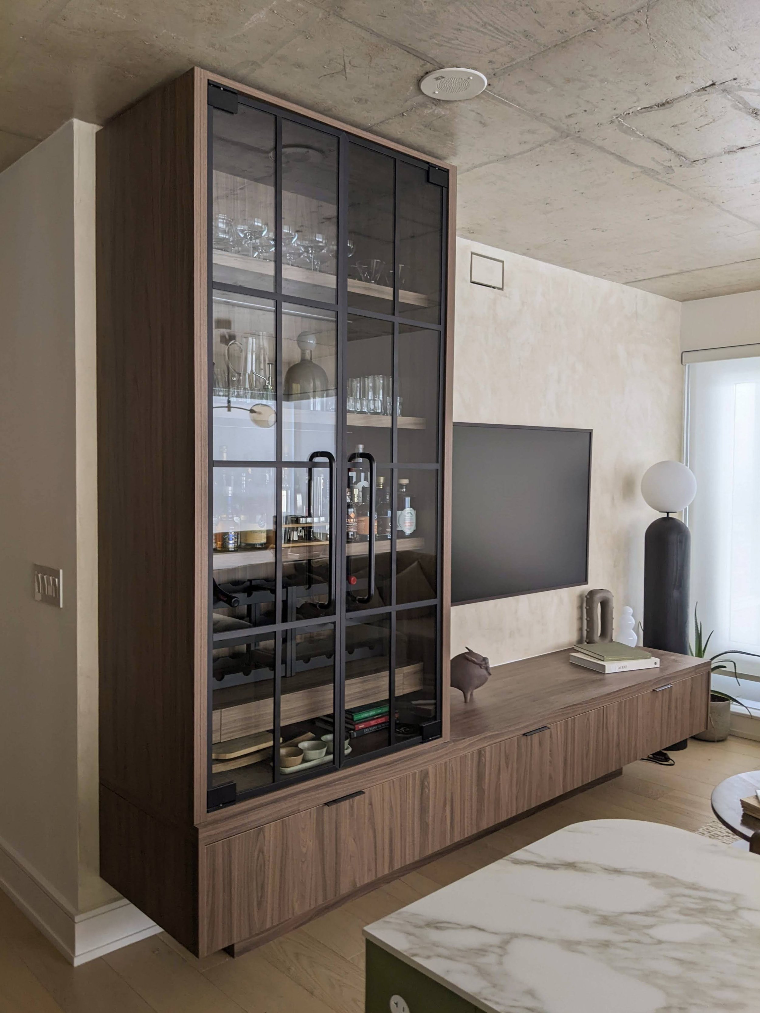 The bar and media console are covered in a high pressure laminate with a walnut effect. 