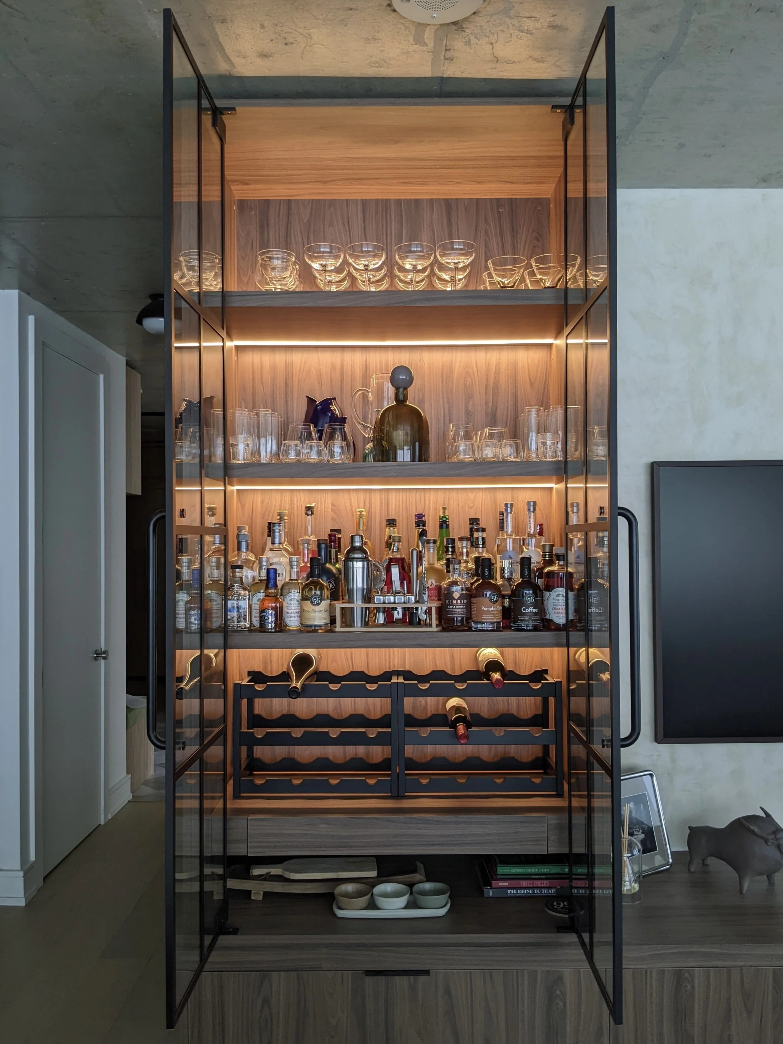We integrated LED lighting in cabinet to create an ambient light source.