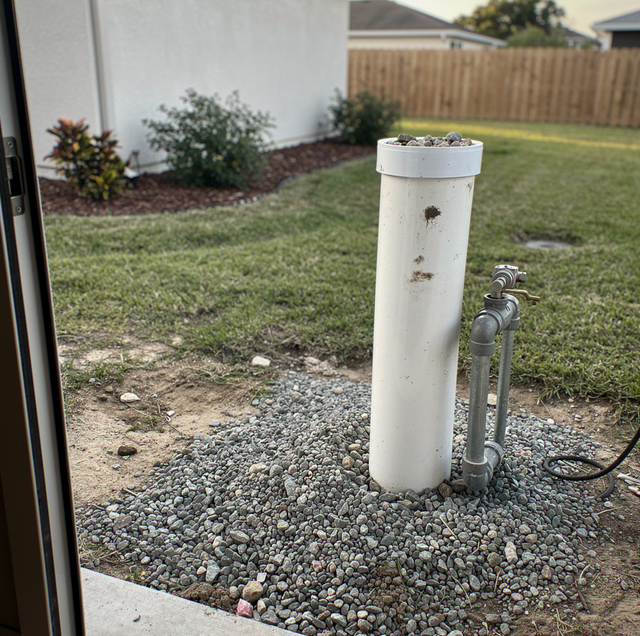 new steel well casing sleeve installed inside old water well