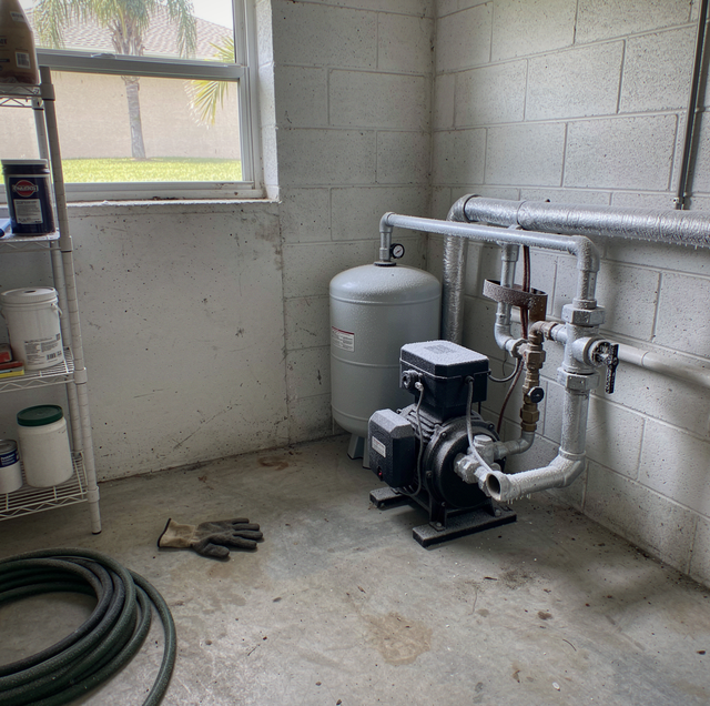 outdoor industrial pump system in winter snow