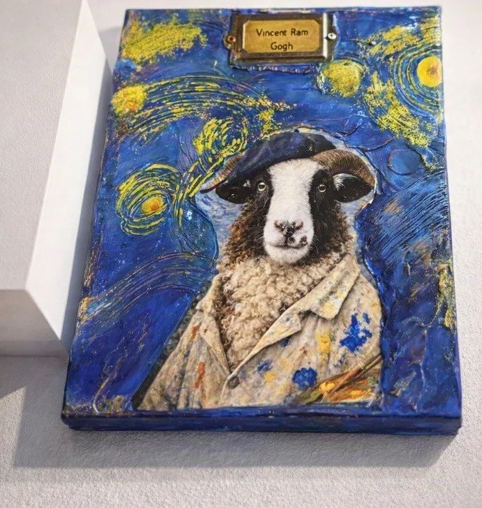 Mixed media art piece of a sheep with the face of a dog, dressed as Vincent van Gogh, with a starry night background and a plaque that reads "Vincent Ram Gogh."