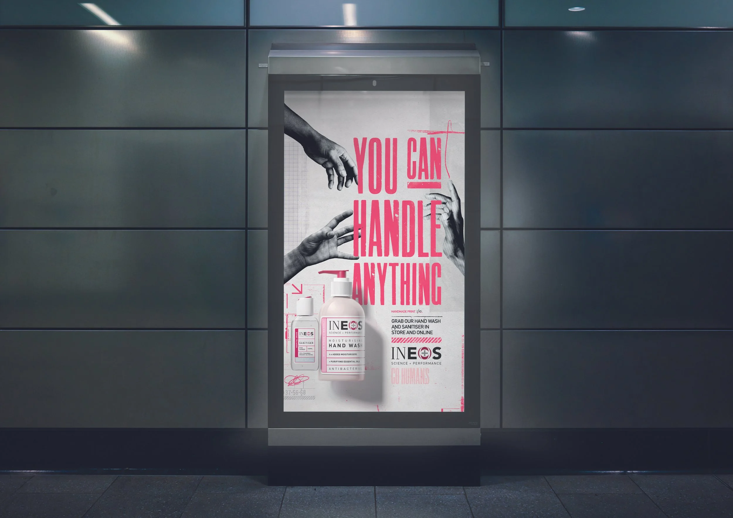 A poster in an elevator with the message 'You can’t handle anything' in bold pink letters, depicting various hands reaching toward each other and bottles of hand sanitizer below.
