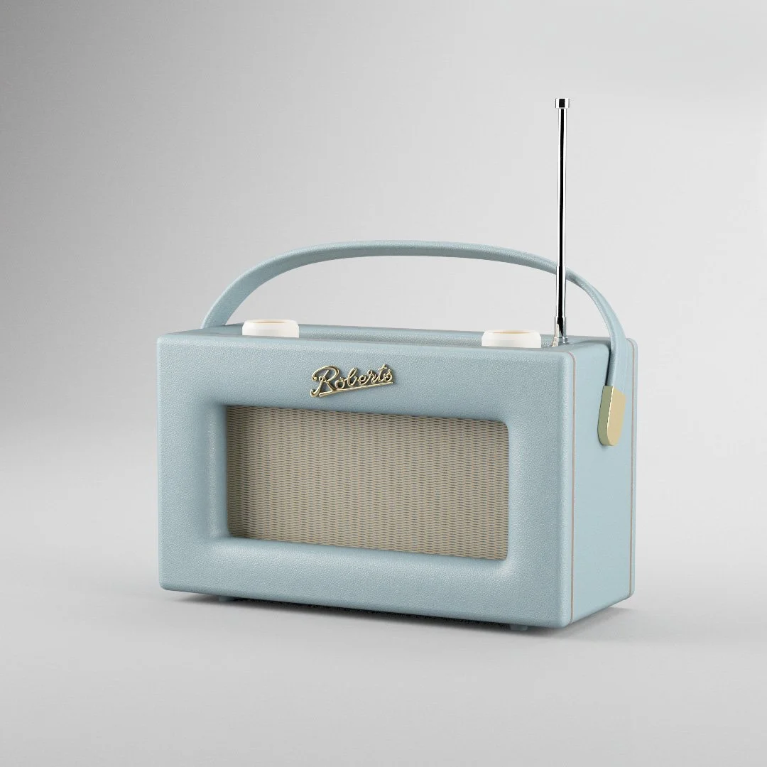 A vintage-style light blue portable radio with a handle, speaker grille, and an extended antenna.