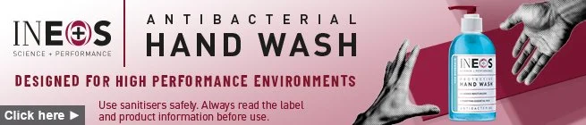 Sign for antibacterial hand wash by INEOS, with a bottle of hand sanitizer and gloves displayed.