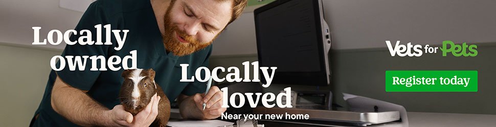 A man holding a guinea pig on a desk next to a computer monitor with promotional text superimposed, including "Locally owned," "Locally loved," and "Near your new home," for Vets for Pets website with a green "Register today" button.