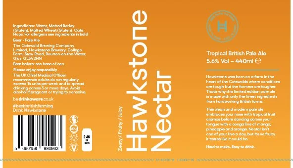 A close-up of a beer label for Hawkesstone Nectar, a Tropical British Pale Ale, 5.6% alcohol, 440ml. The label is orange with white and blue text, listing ingredients and brewery information.