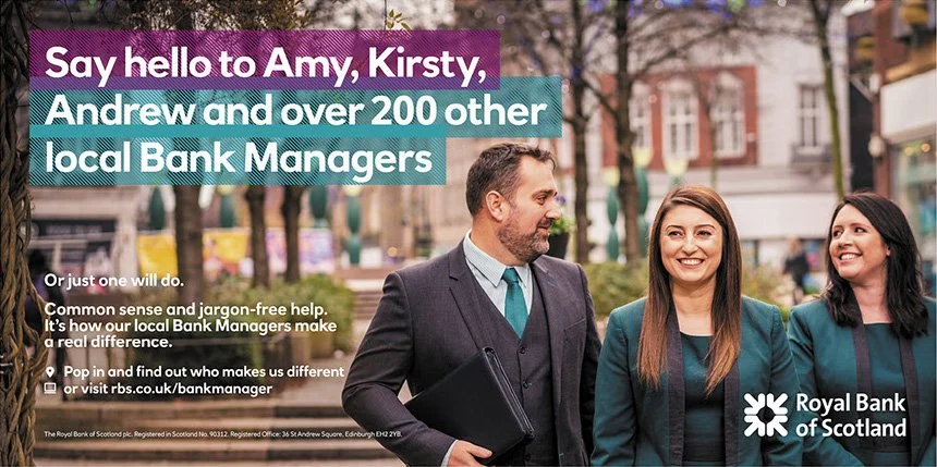 Three bank managers, two women and one man, are walking outdoors in a city street, smiling and dressed in matching teal blazers. The background features trees and buildings. The text promotes the Royal Bank of Scotland, mentioning Amy, Kirsty, Andrew