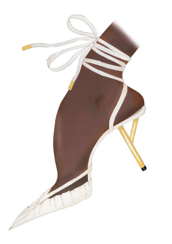 A shoe designed to look like an eagle's head with a sharp beak, brown and white coloration, and a high heel, resembling an artistic fashion piece