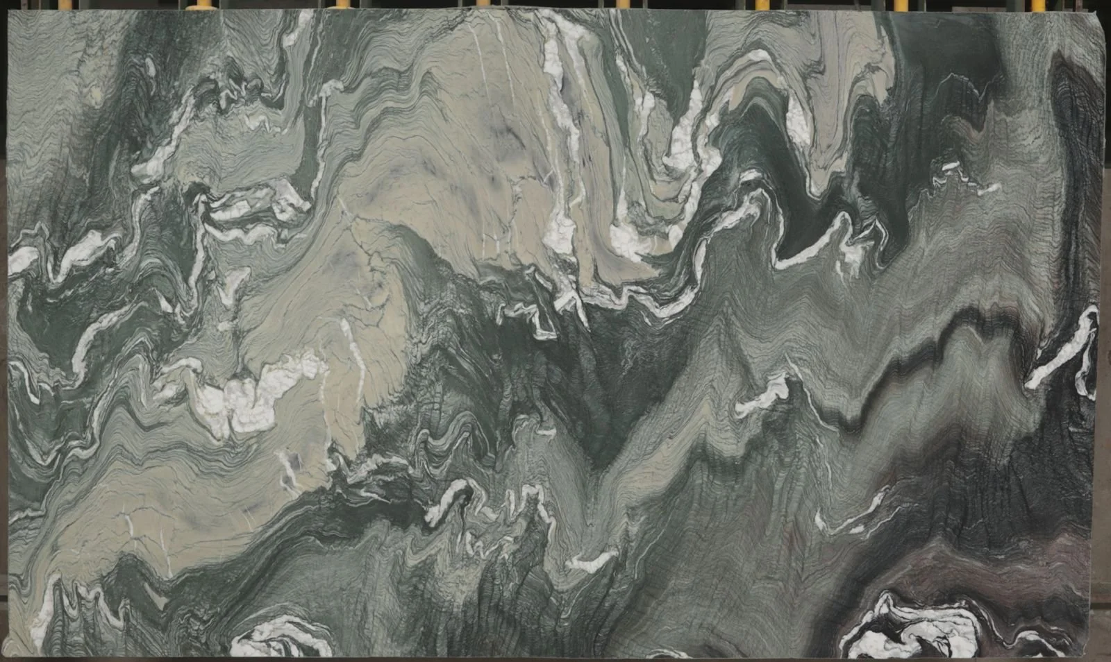 Polished green and gold marble slab from G STONE's stone range