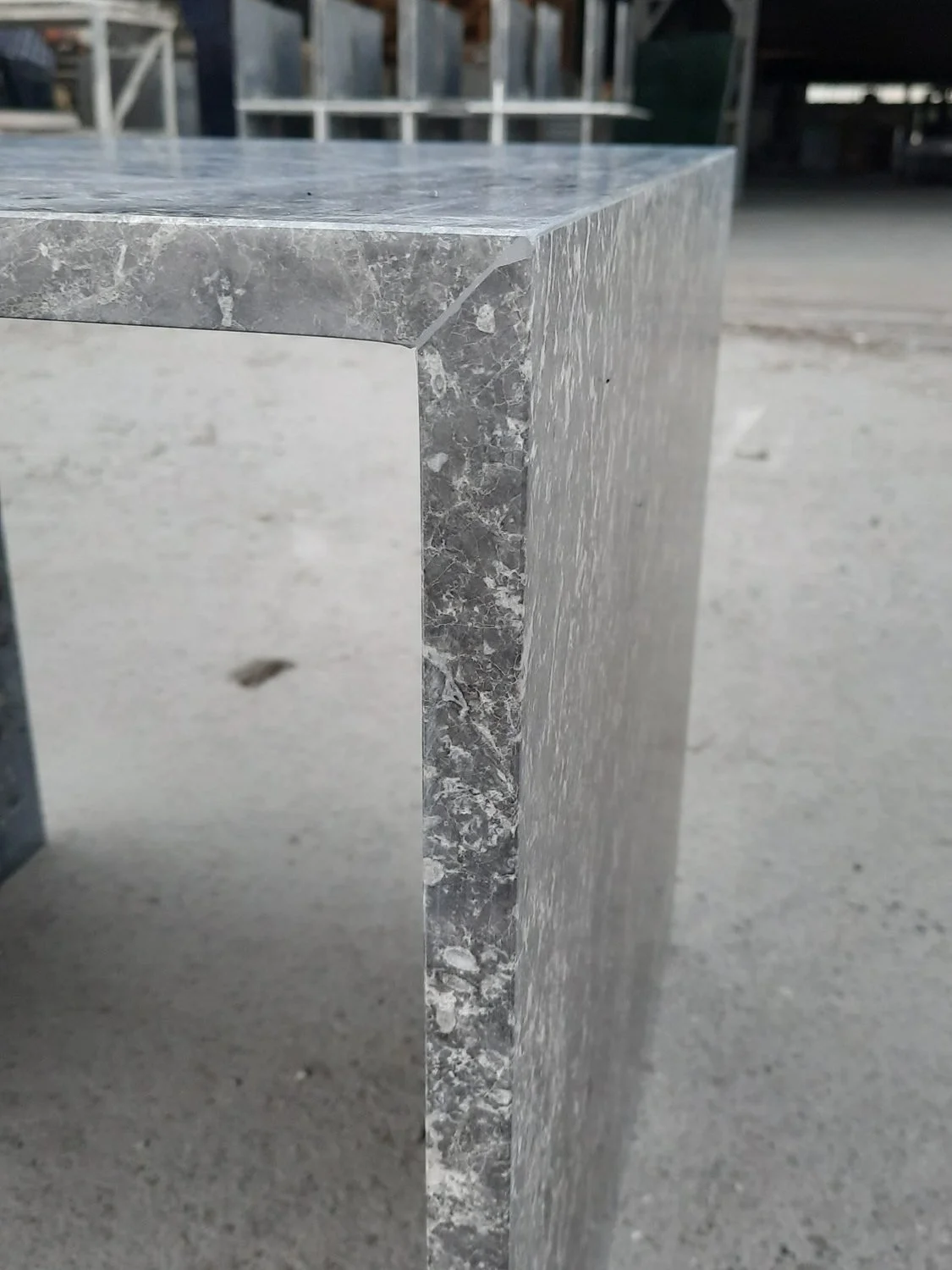 Mitred stone edge
