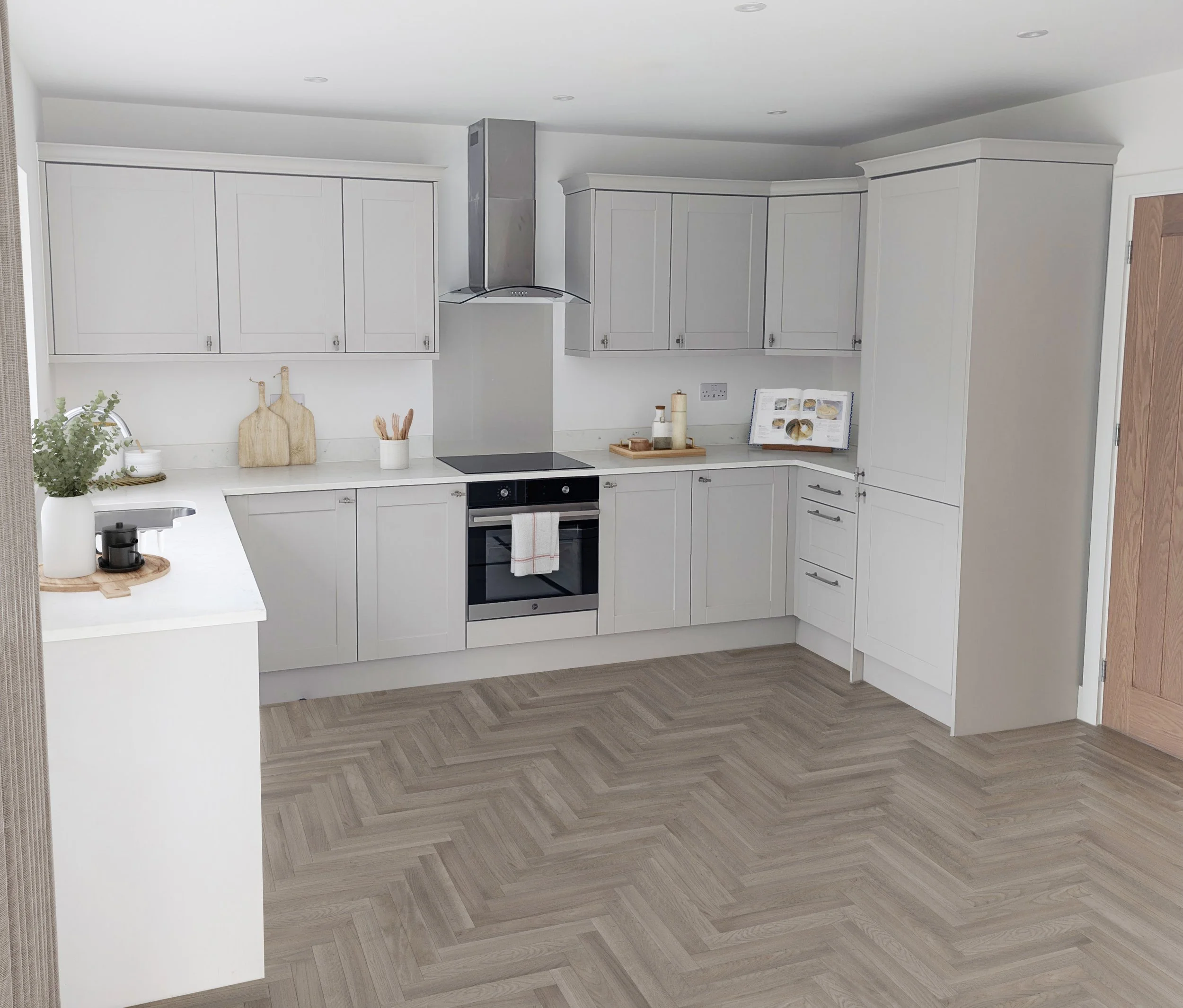 White kitchen with upper cabinets, a black induction cooktop, a built-in oven, and wooden flooring.