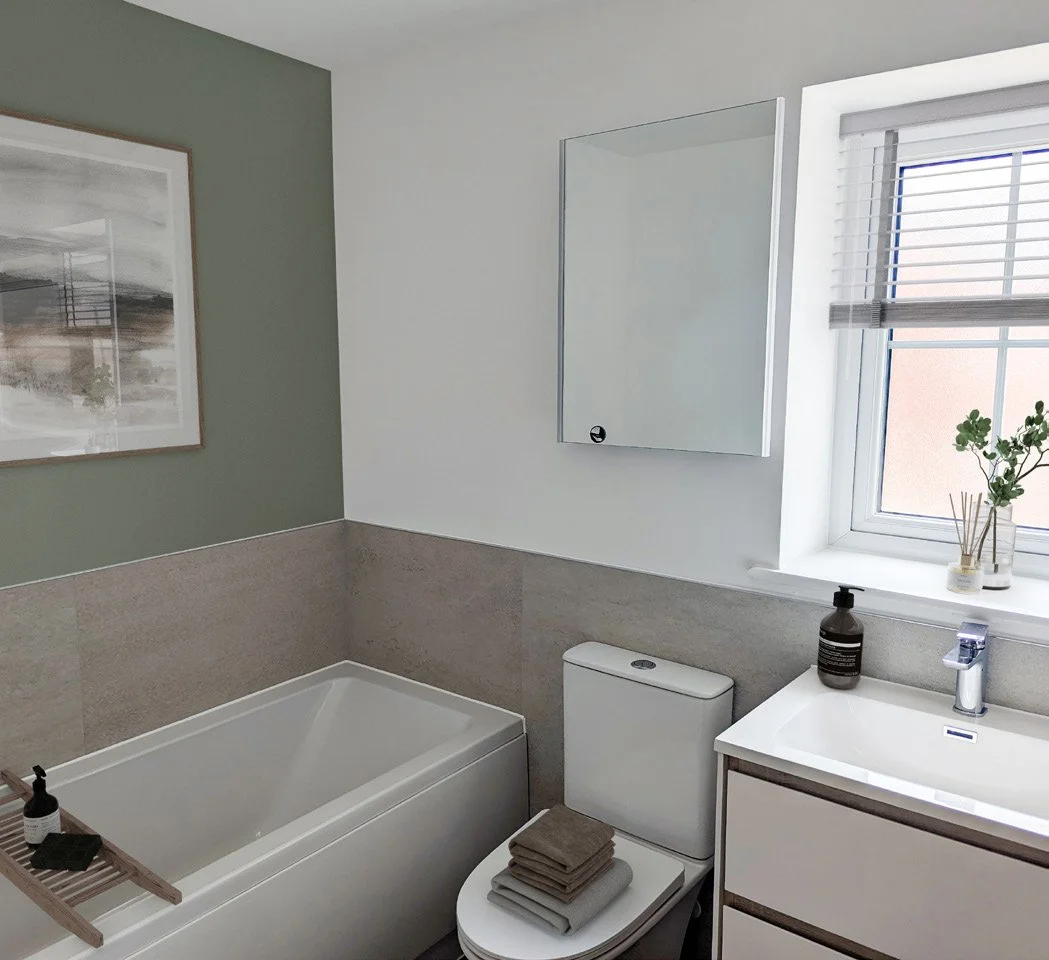 A modern bathroom with a bathtub, toilet, white vanity, window with blinds, and a mirror on the wall.