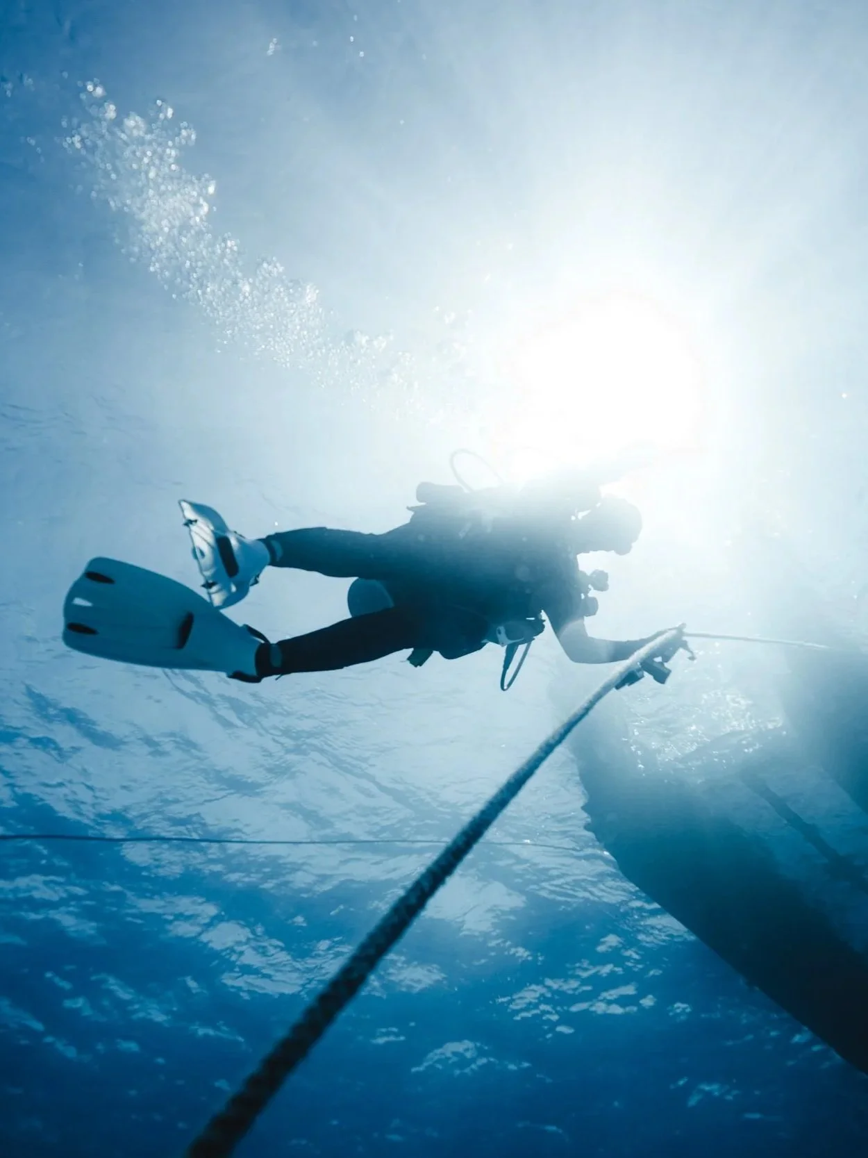 Shannon Aldridge ascending to the boat from a SCUBA dive.