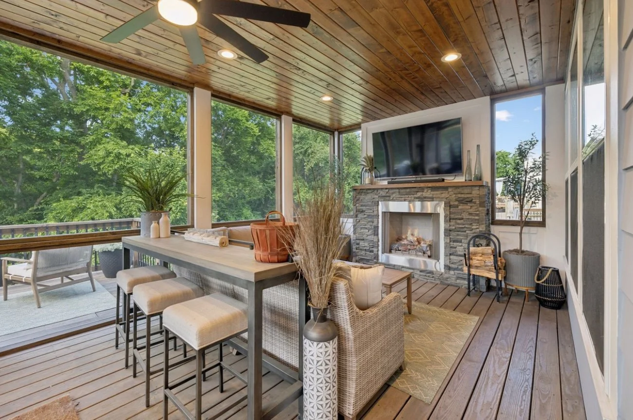 Screened porch addition with stone & gas fireplace, wood tongue and groove ceiling