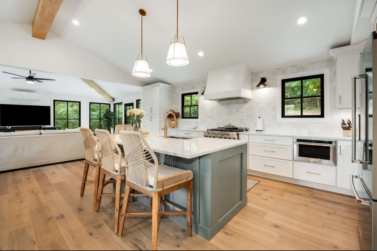 Engineered hardwood, kitchen island & quartz countertop, recess lights & pennant lights