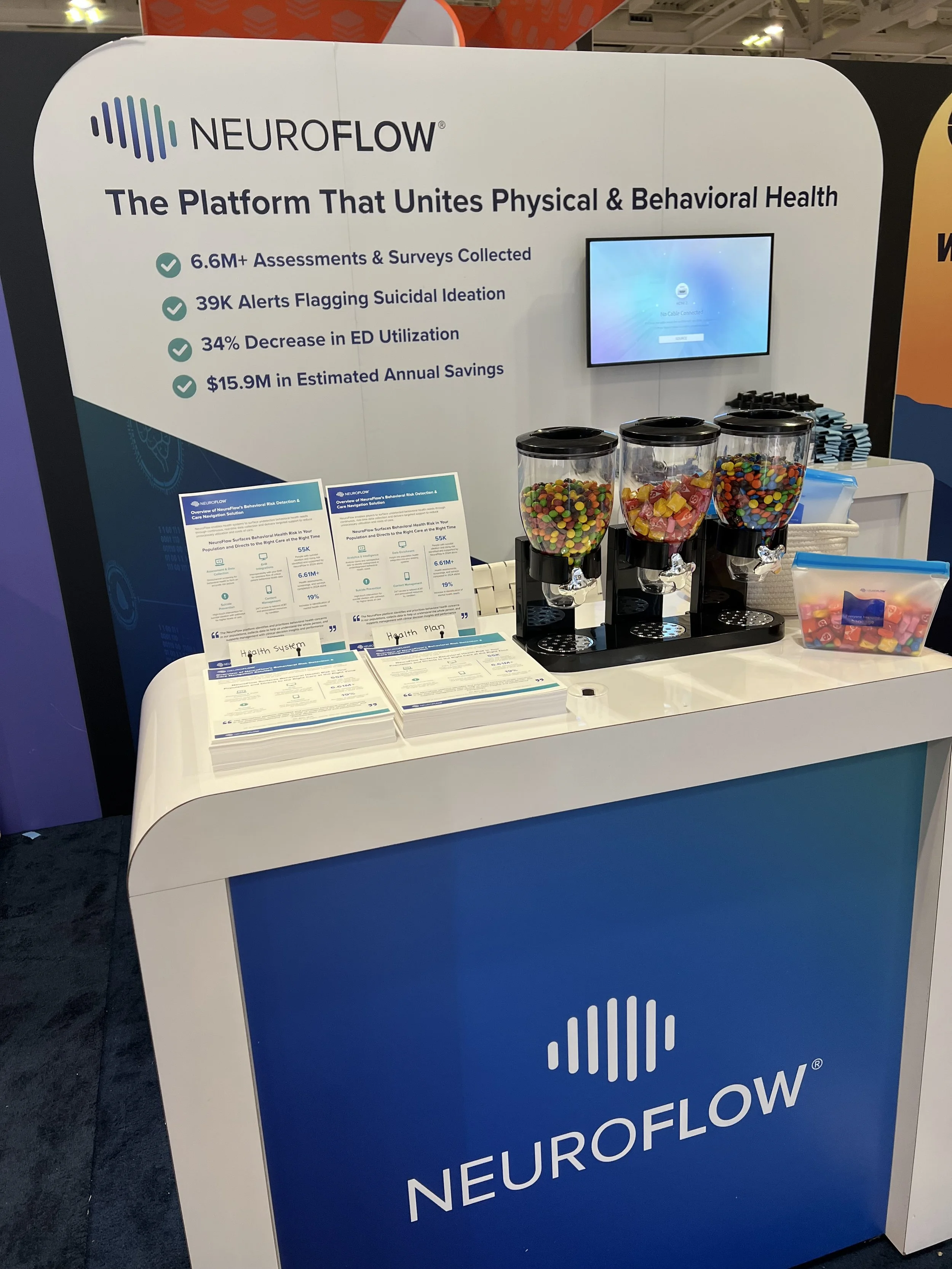 Exhibitor booth display for NeuroFlow at the HLTH Conference in Nashville, TN