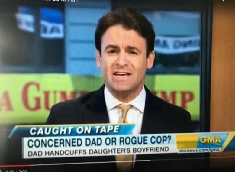 TV news anchor reporting with a headline about a contentious situation involving a dad and daughter, displayed on the screen behind him.