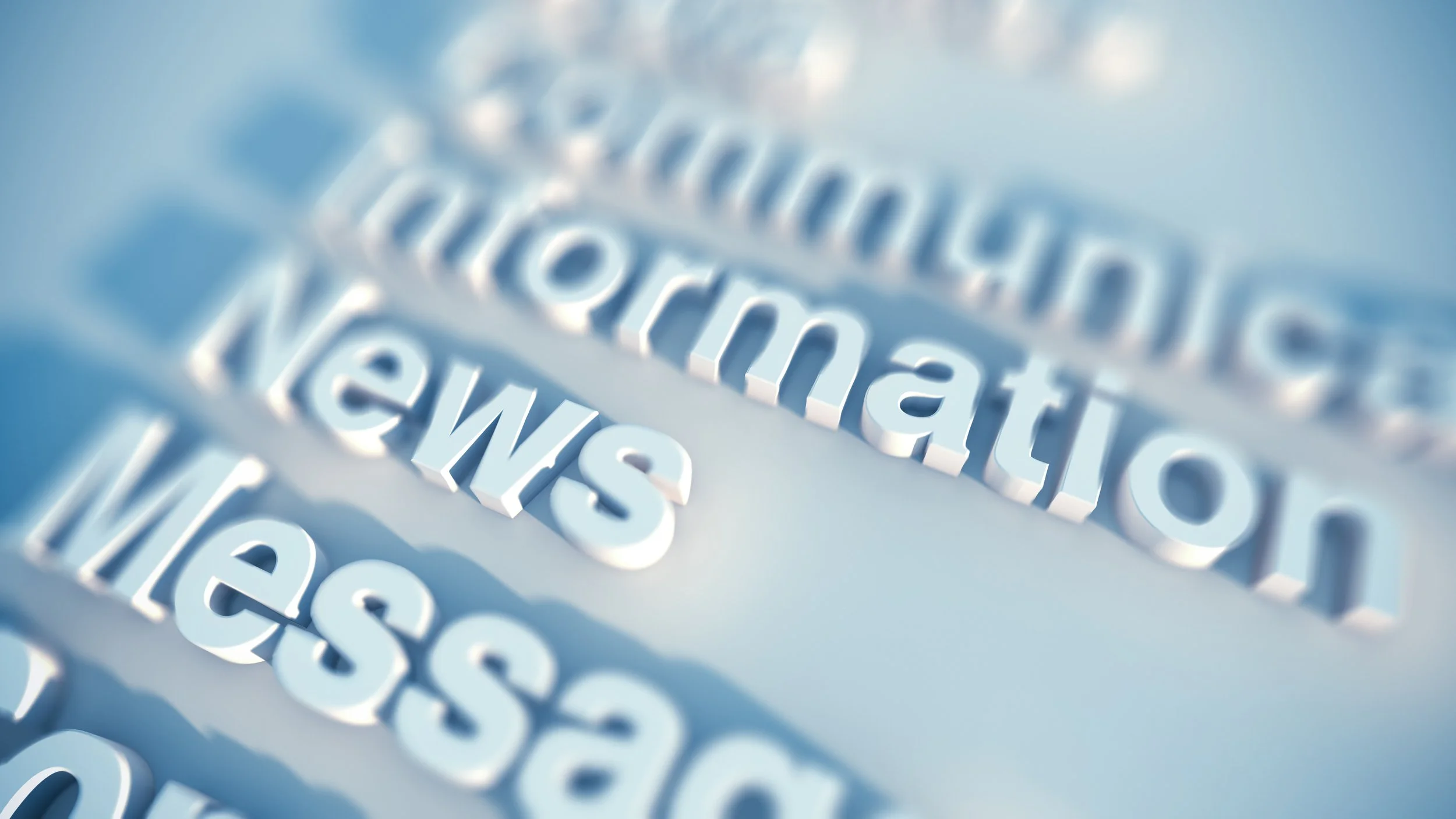 Close-up of stylized white 3D words on a reflective surface, creating a layered and abstract visual effect.