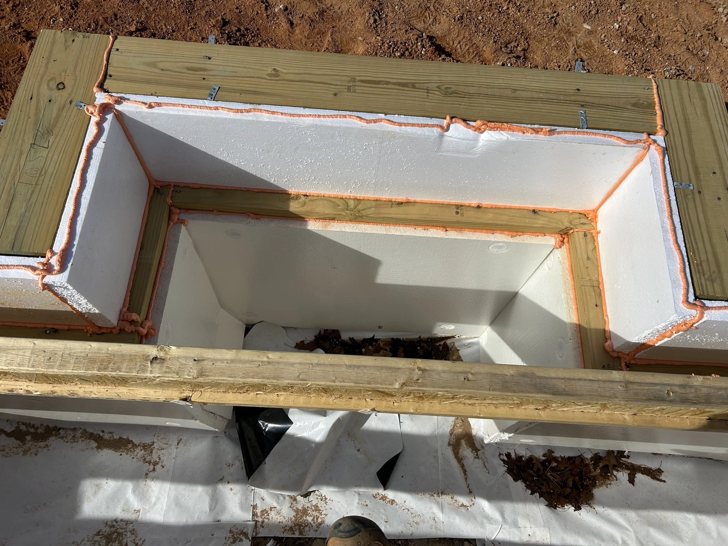 2" ridgid insulation foam board installed on all foundation walls from crawlspace floor to level with top of floor joists. Spray foam insulation placed in any possible voids.
