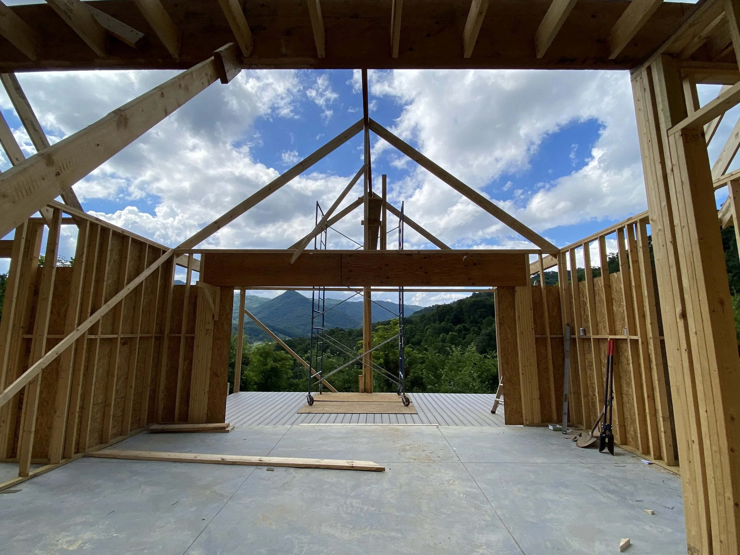 Framing of the porch roof. Roughly 9/12 roof pitch.