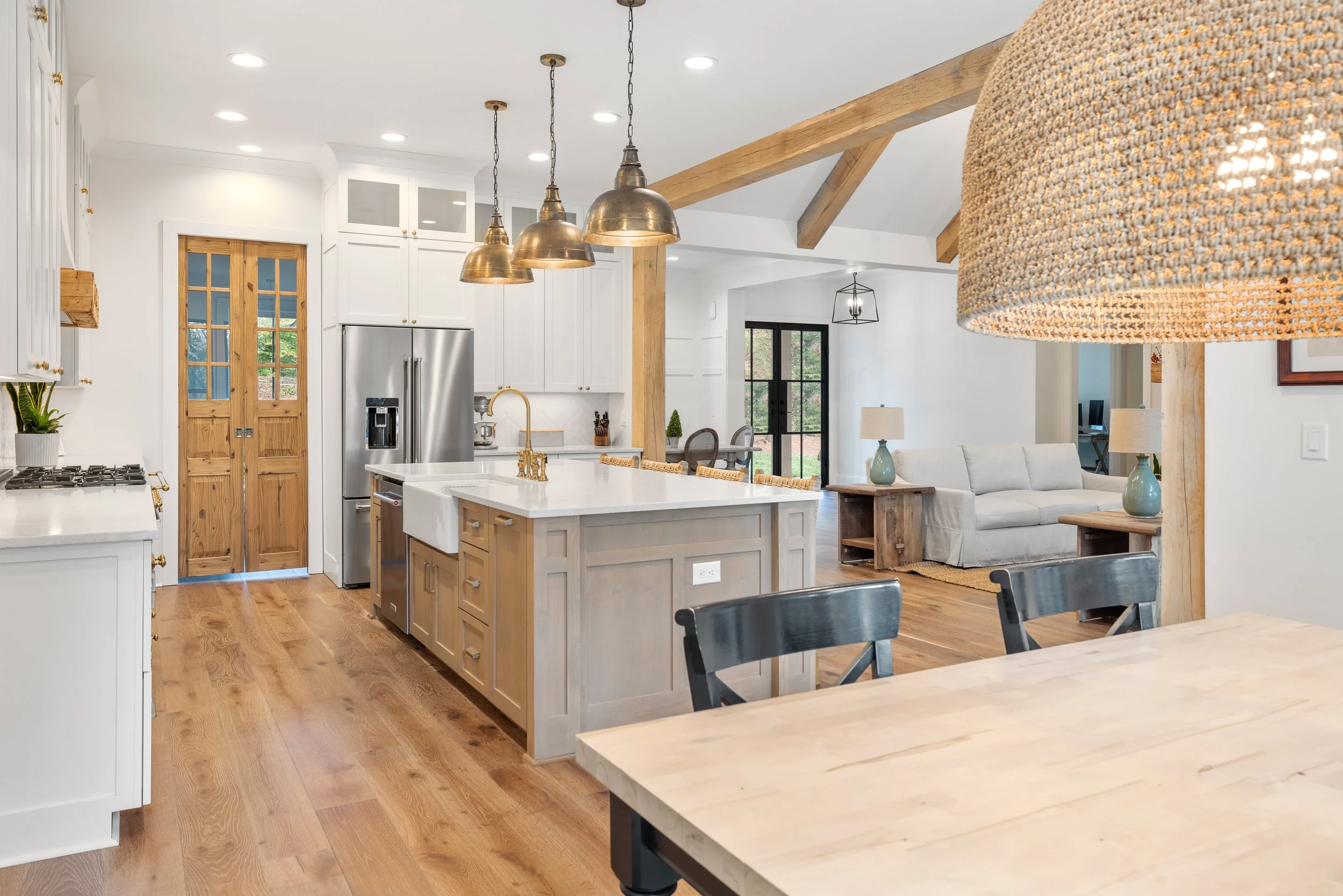 Custom cabinetry. 8x8 solid white oak decorative beams.