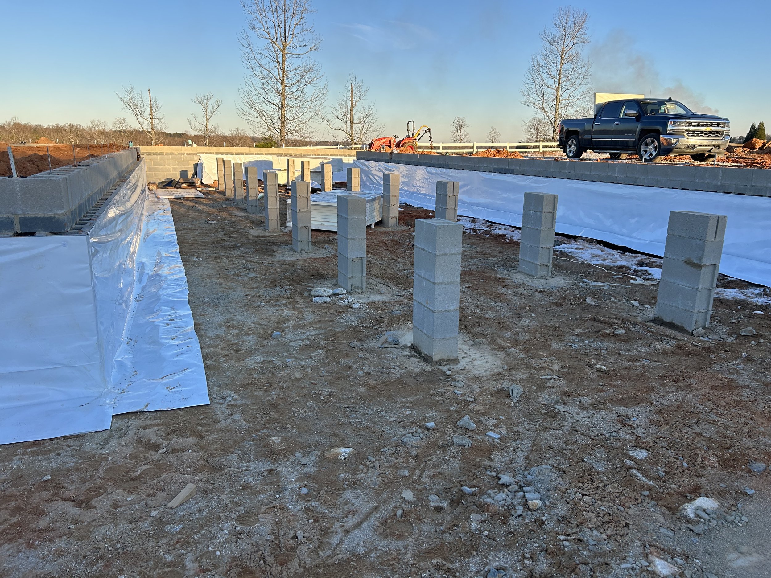 20mil poly installed on walls for beginning of crawlspace encapsulation. 