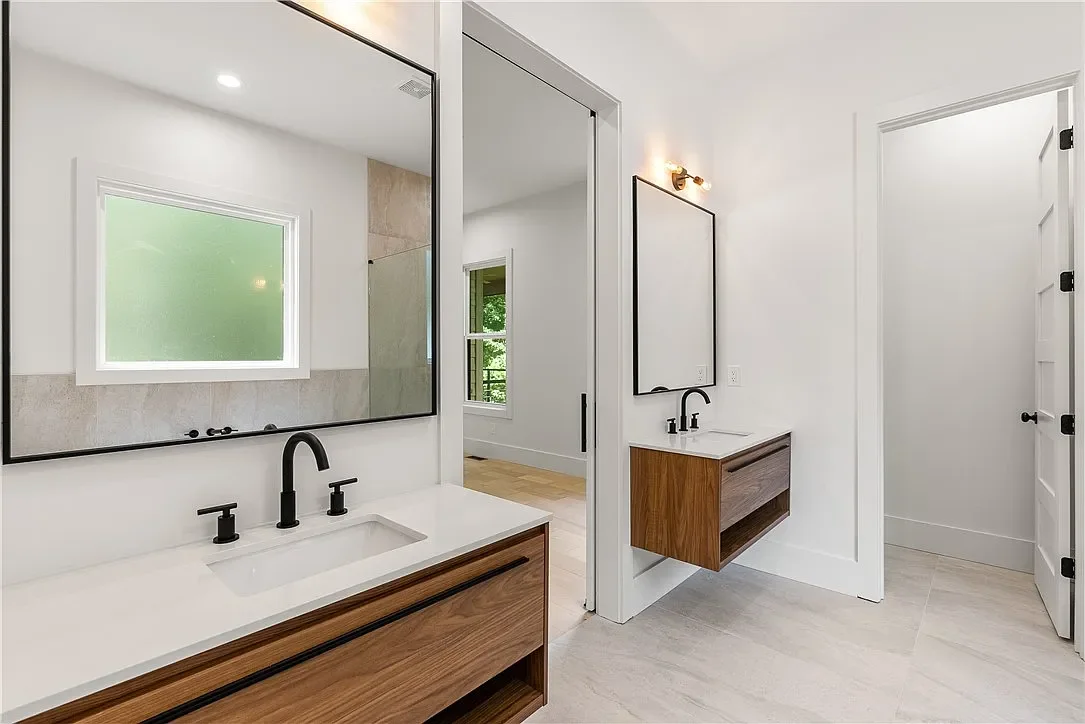 Separate wall mount vanities.
