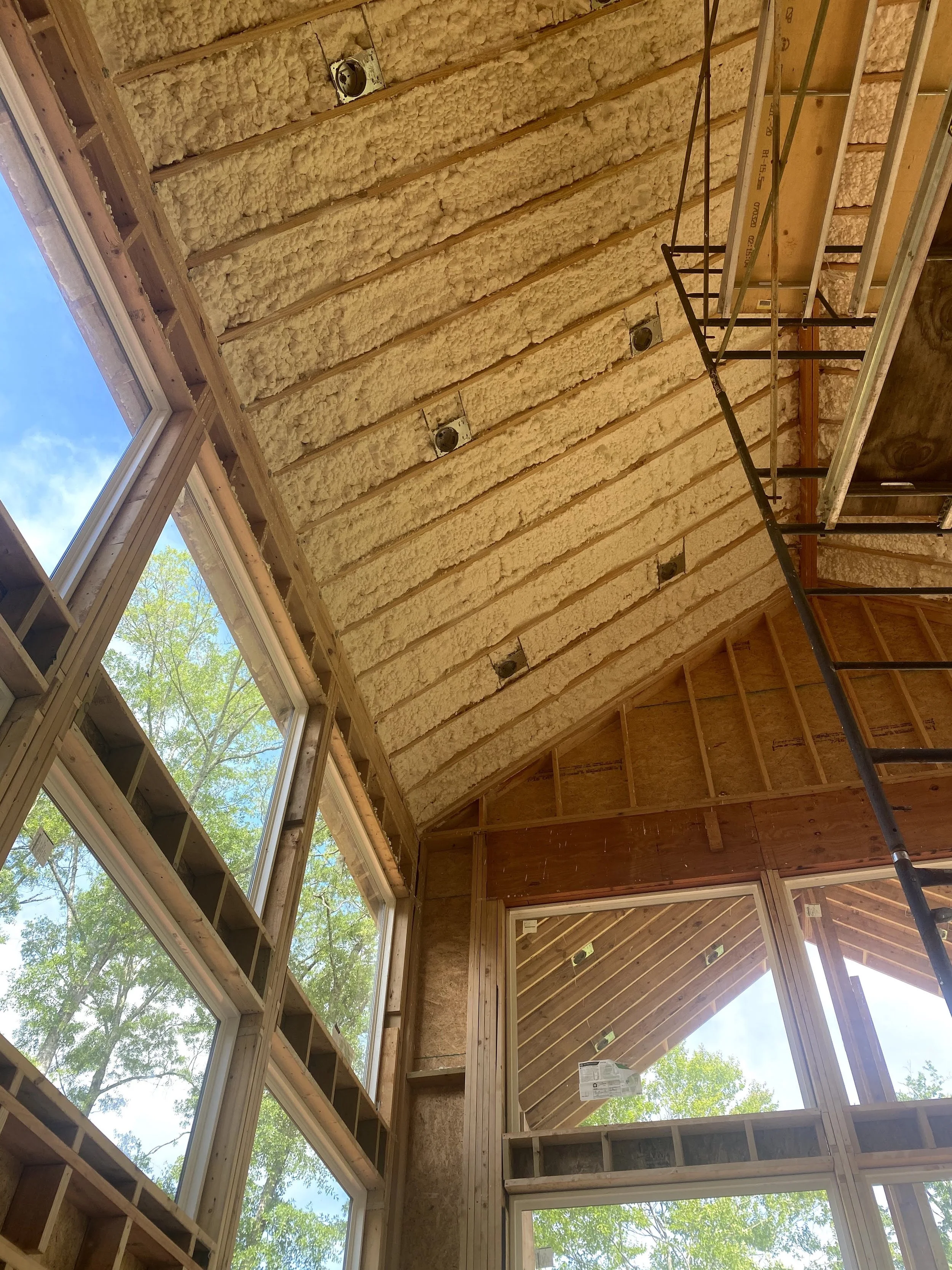 Spray foam insulation sprayed on all of roof deck.