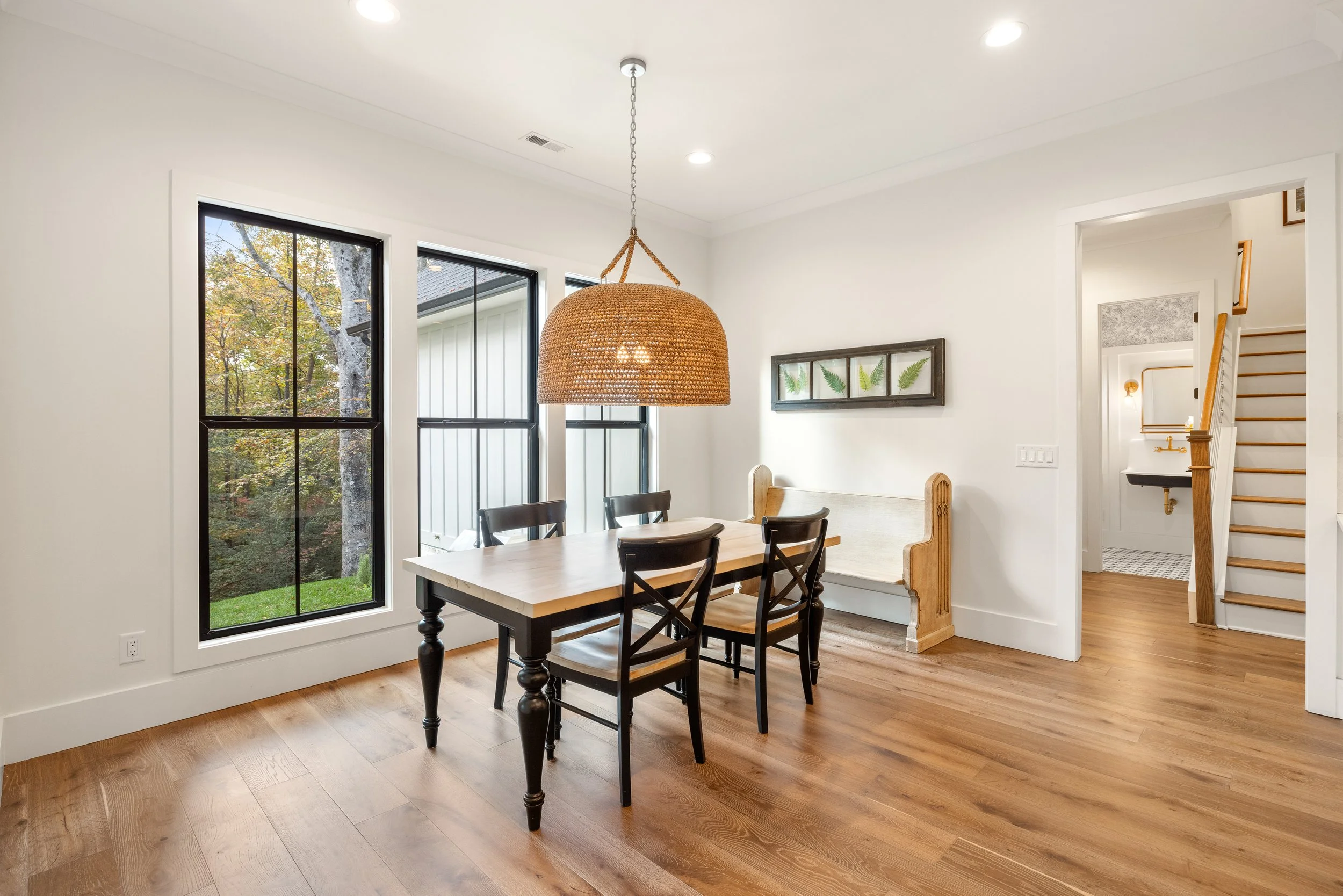 Breakfast area. Wide plank engineered hardwood flooring.