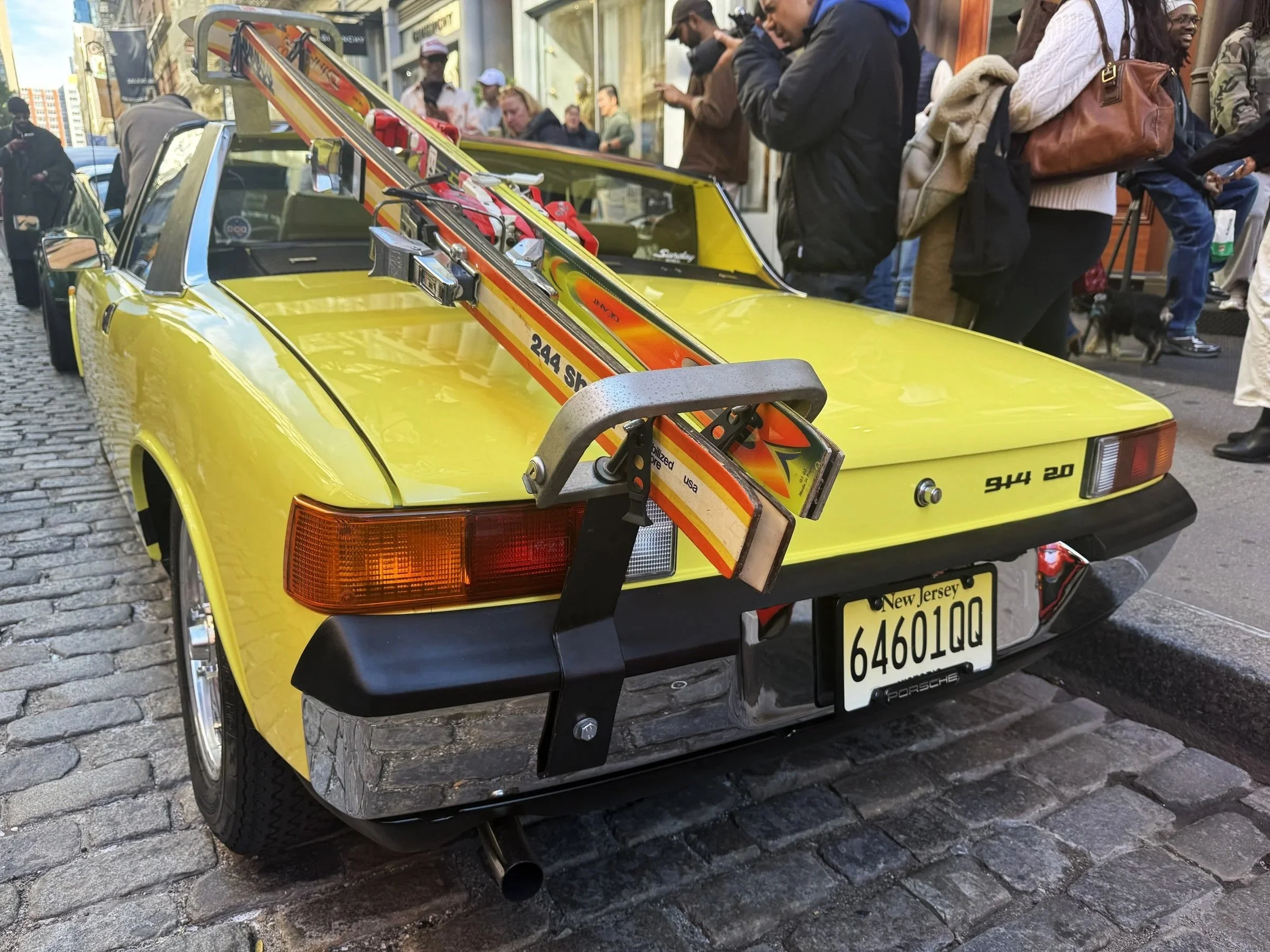 The yellow Porsche 914 carries its skis through SoHo.