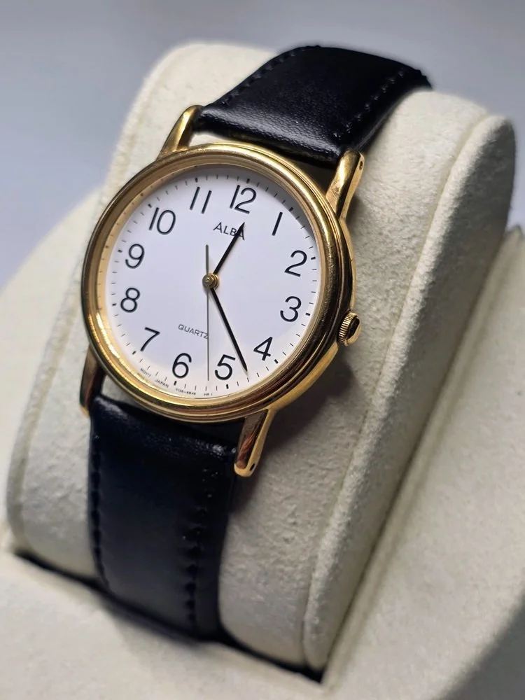 Seiko - Alba Y136 Left.jpg