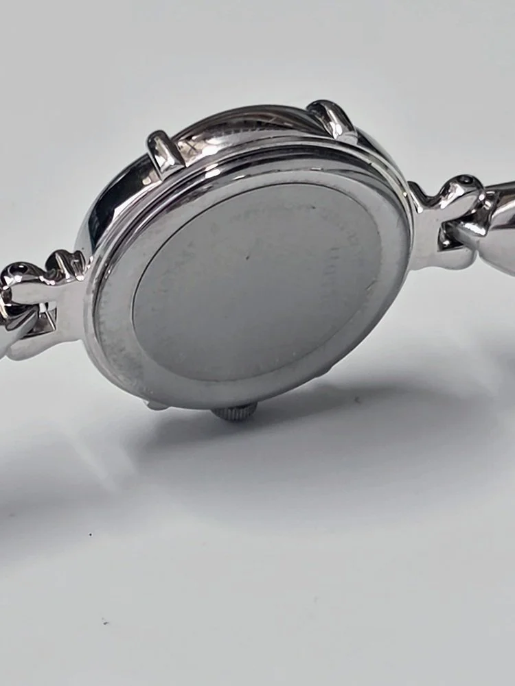 Ricoh Monpérier - Caseback.jpg